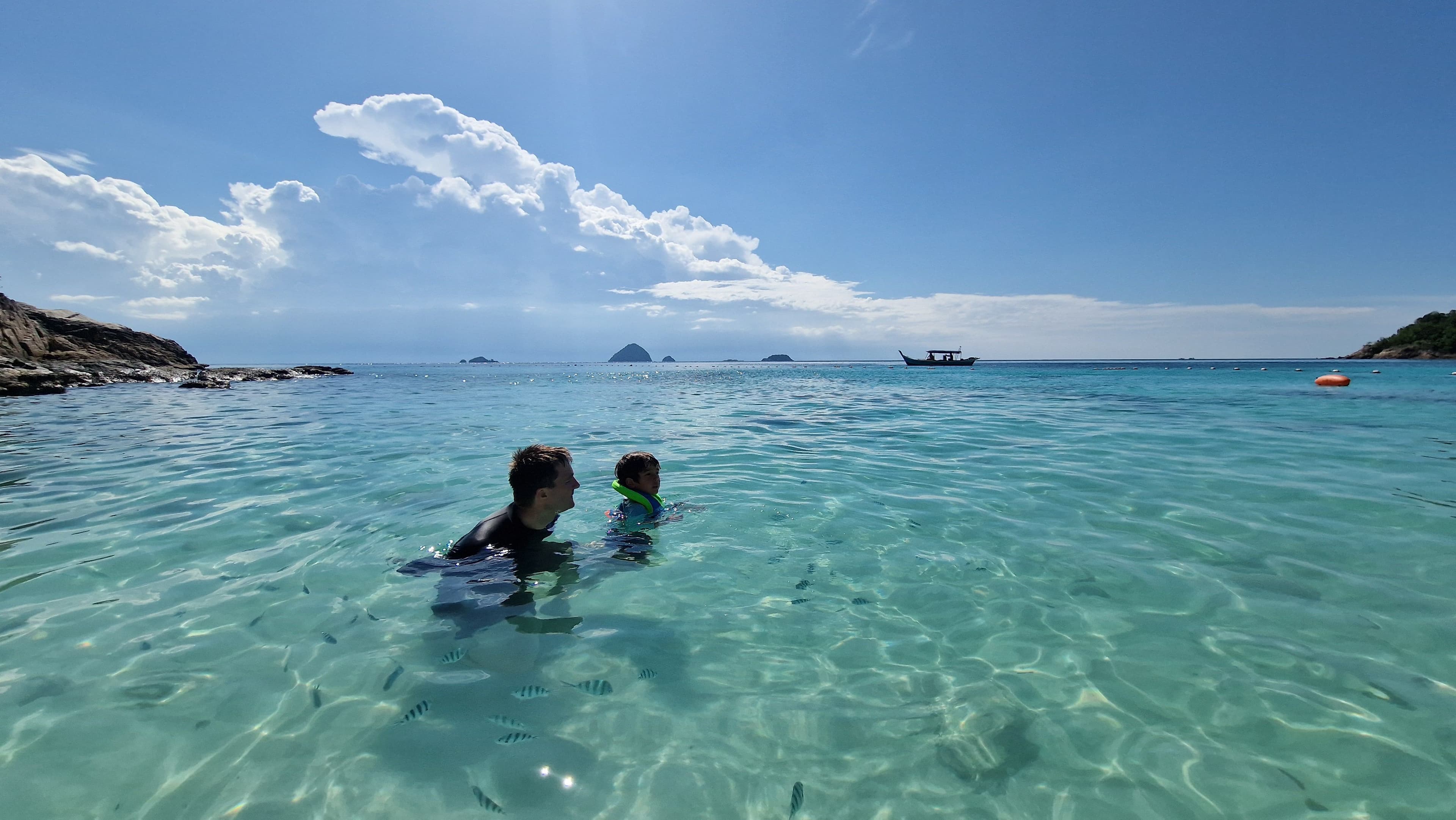 TWO BOYS IN THE SEA